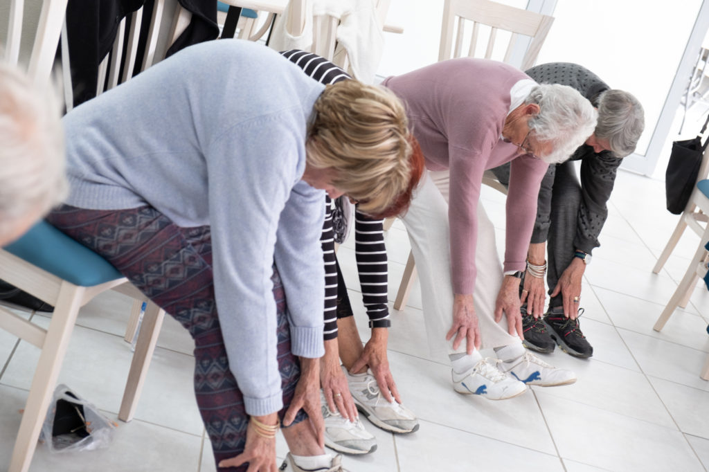 Elderly people exercising