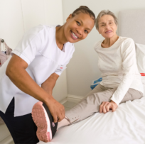 Frail care provider and elderly lady
