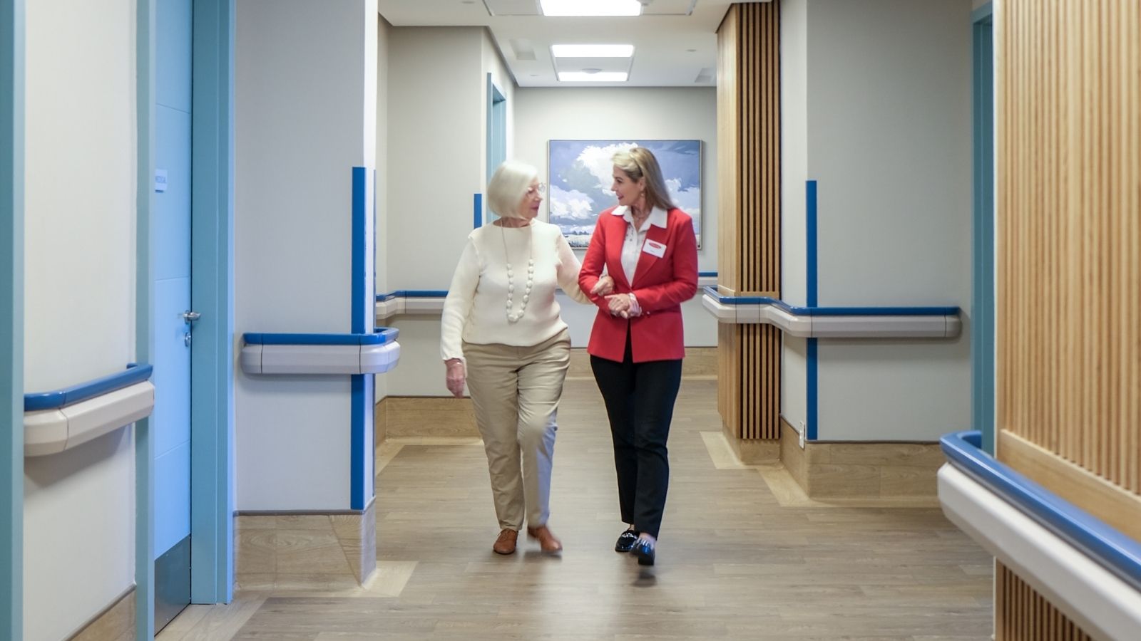 TOTALCARE Living adviser discussing a confident retirement move with a resident