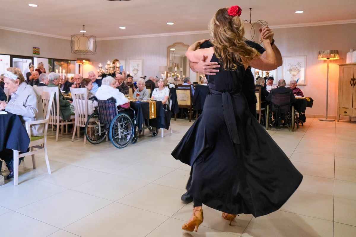 Residents enjoying a social occasion and community life at TOTALCARE Living