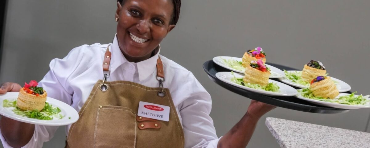 Care member serving nutritious meals