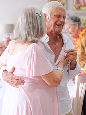 Older adults enjoying dancing together